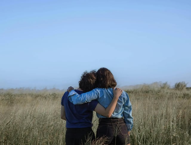 Two travellers in a wheat field